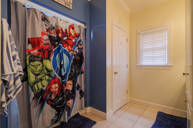 bathroom with tile patterned floors and ornamental molding