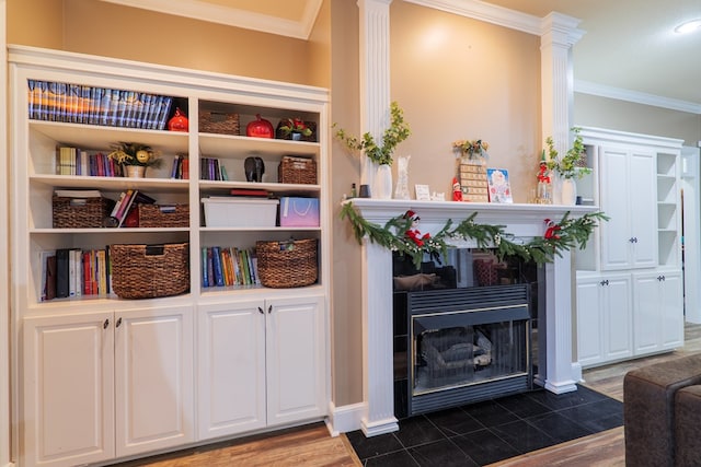 interior space featuring hardwood / wood-style flooring and crown molding