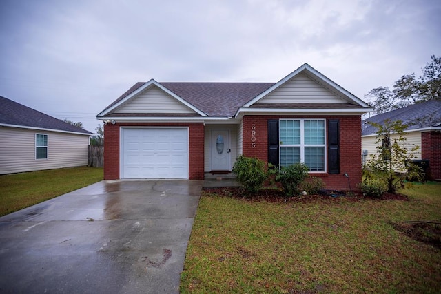 view of front of house featuring a front yard and a garage