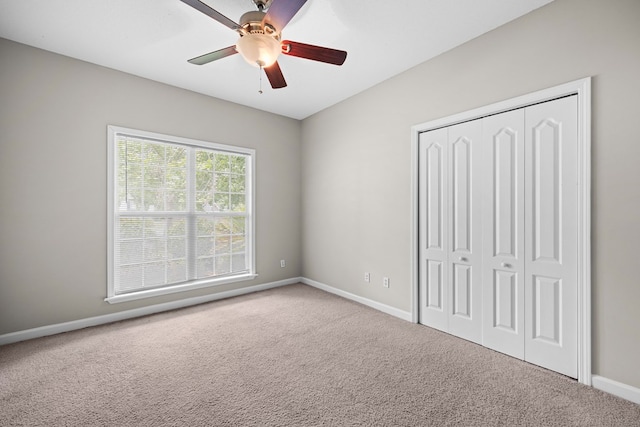 4143 Whithorn Way, Valdosta, GA 31605 - unfurnished bedroom with carpet, a closet, baseboards, and a ceiling fan
