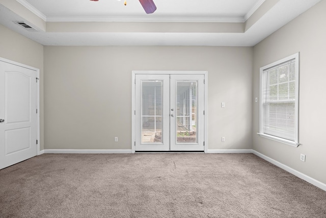 4143 Whithorn Way, Valdosta, GA 31605 - empty room with ornamental molding, a raised ceiling, carpet floors, french doors, and ceiling fan