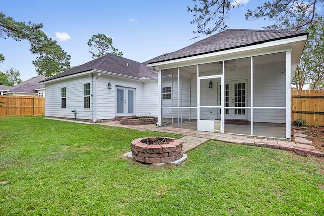 4143 Whithorn Way, Valdosta, GA 31605 - rear view of house featuring french doors, an outdoor fire pit, a patio, a shingled roof, and a ceiling fan