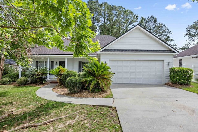 4143 Whithorn Way, Valdosta, GA 31605 - ranch-style house with a porch, concrete driveway, roof with shingles, a garage, and a front lawn