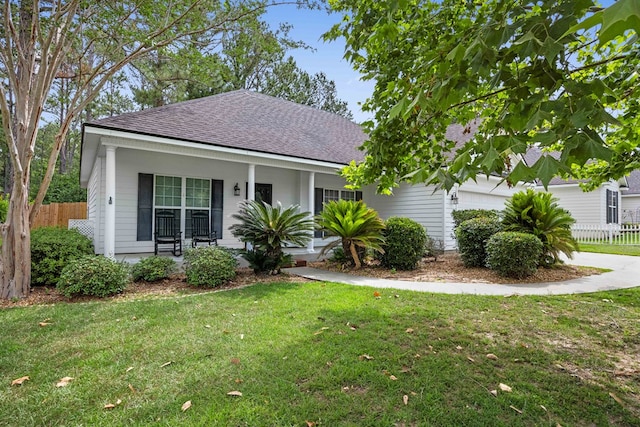 4143 Whithorn Way, Valdosta, GA 31605 - view of front of house with a shingled roof, a porch, and a garage