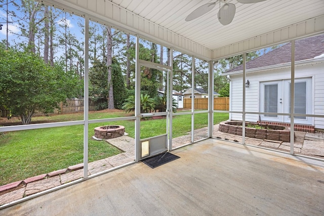 4143 Whithorn Way, Valdosta, GA 31605 - unfurnished sunroom featuring a fire pit, ceiling fan, and french doors