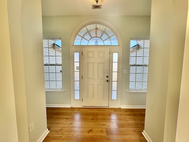 foyer with hardwood / wood-style floors