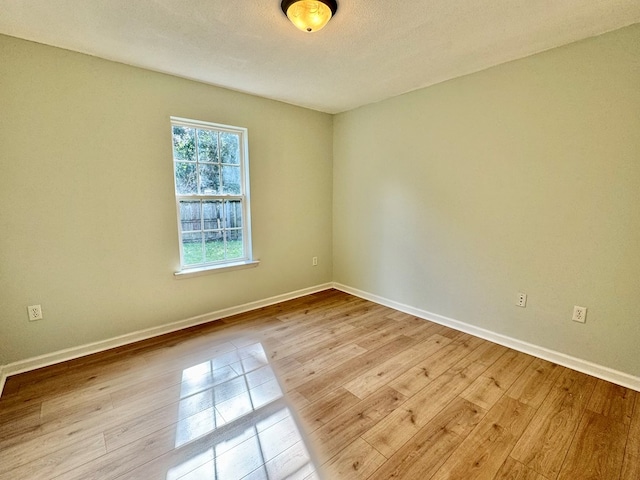 empty room featuring light hardwood / wood-style floors