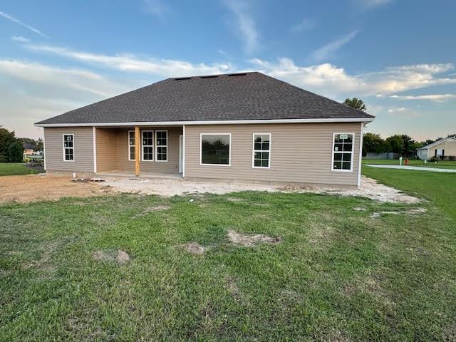 3824 Merriman Ct, Valdosta, GA 31605 - rear view of property featuring a lawn and a patio area