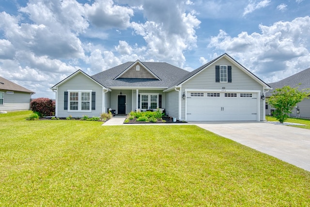 view of front facade with a garage, a shingled roof, a front yard, and concrete driveway