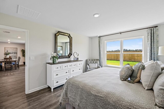 bedroom featuring recessed lighting, visible vents, dark wood finished floors, and baseboards