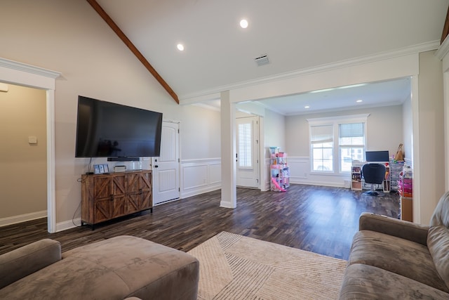 living room featuring hardwood / wood-style flooring, ornamental molding, and high vaulted ceiling