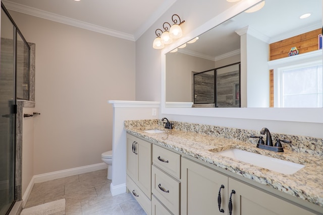 bathroom with vanity, toilet, crown molding, and walk in shower