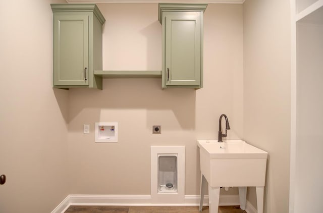 3039 Mary Powell Way, Hahira, GA 31632 - laundry area with hookup for an electric dryer, hookup for a washing machine, baseboards, and cabinet space