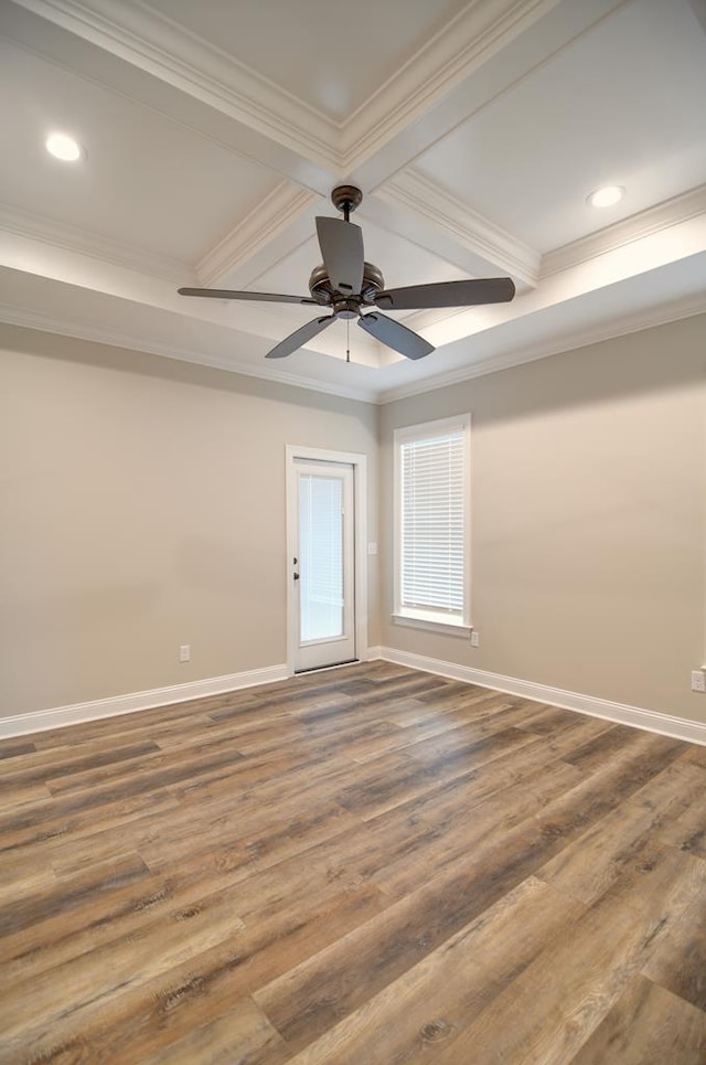 3039 Mary Powell Way, Hahira, GA 31632 - empty room with coffered ceiling, ornamental molding, baseboards, dark wood-type flooring, and beam ceiling