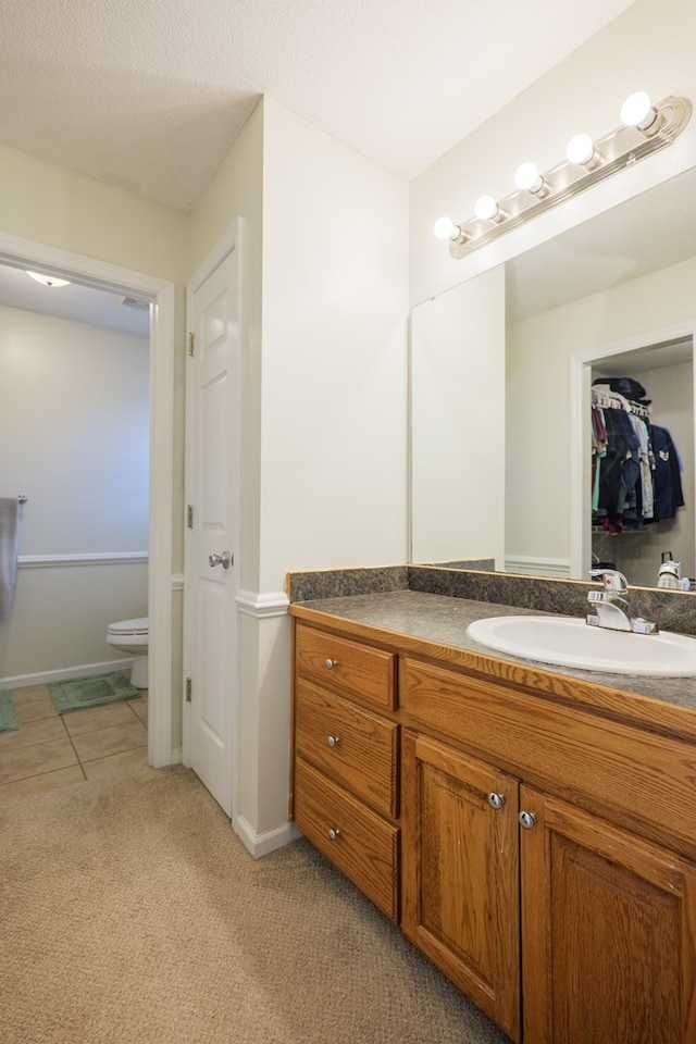 5187 Calvary Cir, Valdosta, GA 31605 - bathroom with vanity and tile patterned flooring