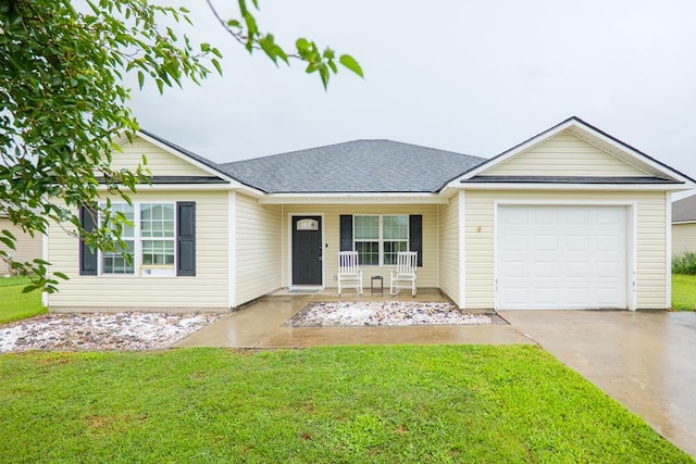 5187 Calvary Cir, Valdosta, GA 31605 - view of front of house featuring concrete driveway, covered porch, a front lawn, and an attached garage