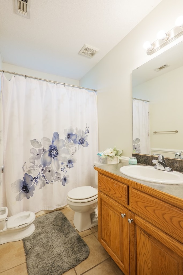 5187 Calvary Cir, Valdosta, GA 31605 - full bath featuring tile patterned flooring and vanity