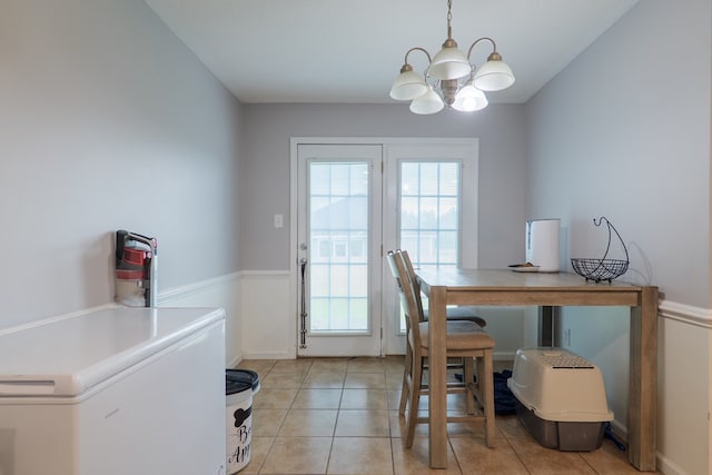 5187 Calvary Cir, Valdosta, GA 31605 - dining room featuring a chandelier, healthy amount of natural light, and light tile patterned floors