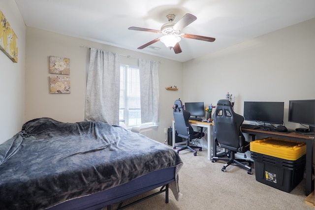 5187 Calvary Cir, Valdosta, GA 31605 - carpeted bedroom with an office area and ceiling fan