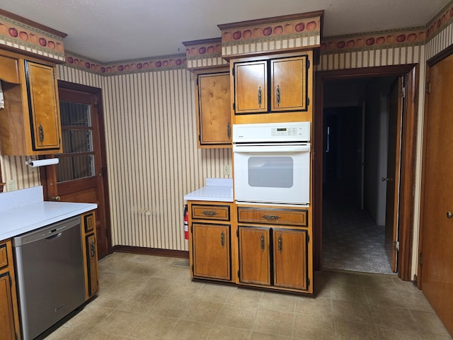 kitchen featuring oven and dishwasher