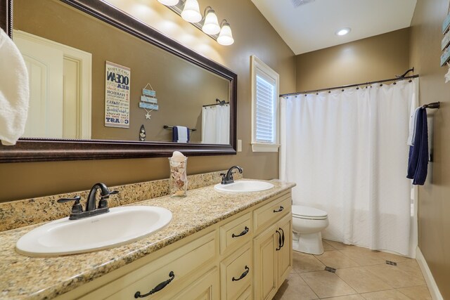 5080 Carlton Ridge Cir, Hahira, GA 31632 - bathroom with double vanity and tile patterned floors