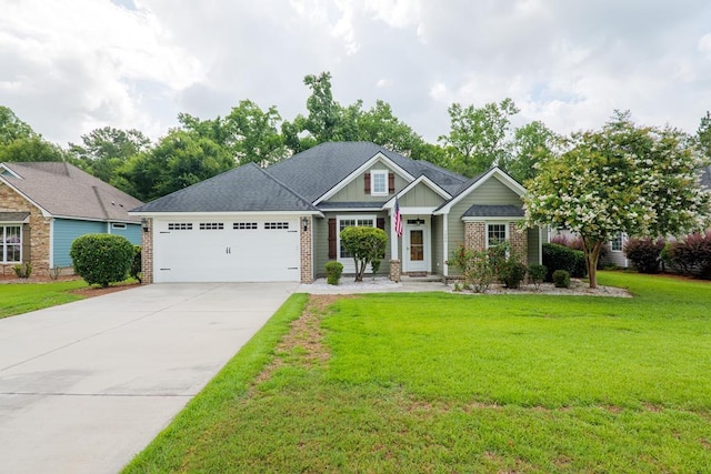 5080 Carlton Ridge Cir, Hahira, GA 31632 - craftsman-style home featuring board and batten siding, a garage, driveway, and brick siding