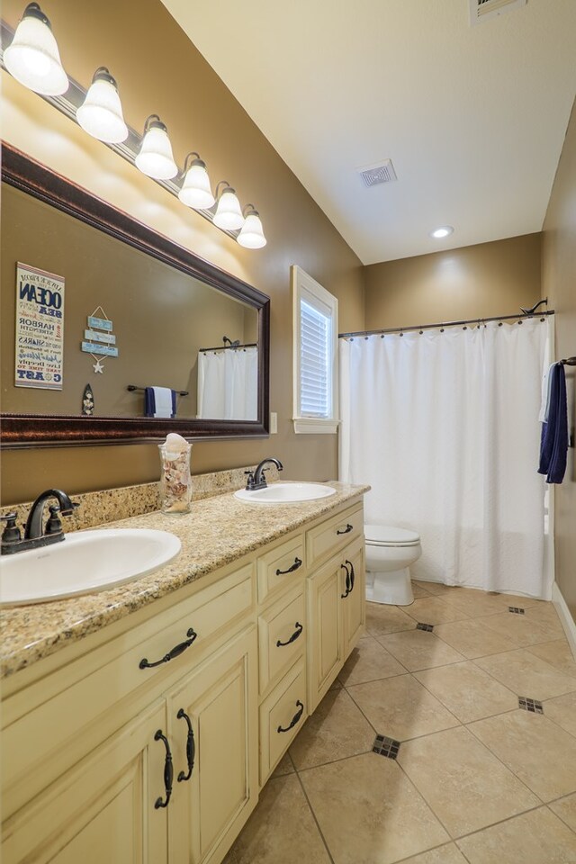 5080 Carlton Ridge Cir, Hahira, GA 31632 - bathroom with double vanity, tile patterned floors, a shower with curtain, and recessed lighting