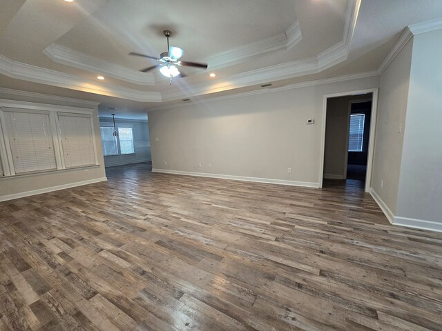 kitchen with light stone counters, appliances with stainless steel finishes, decorative light fixtures, and backsplash