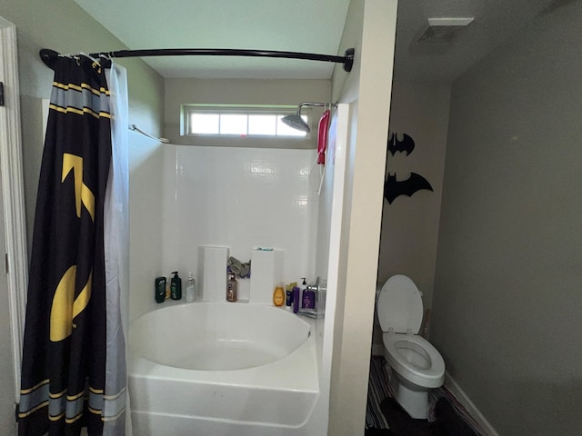 5612 Emily Ln, Hahira, GA 31632 - bathroom with toilet and shower / bath combo