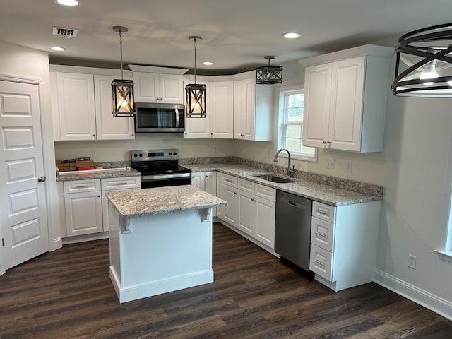 kitchen featuring white cabinets, sink, and stainless steel appliances