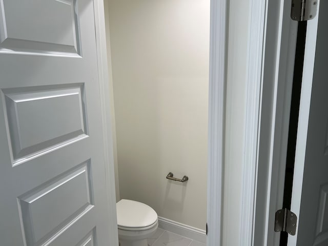 bathroom featuring toilet