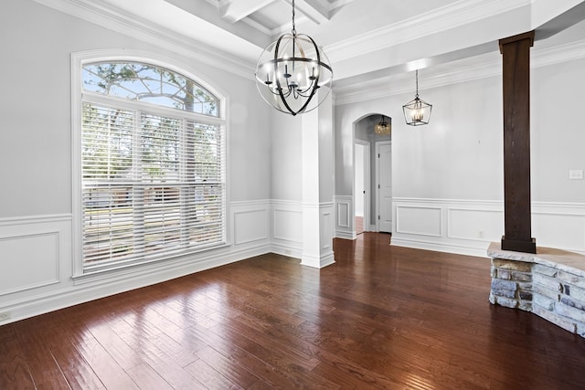 unfurnished dining area with arched walkways, beam ceiling, a notable chandelier, wood-type flooring, and ornate columns