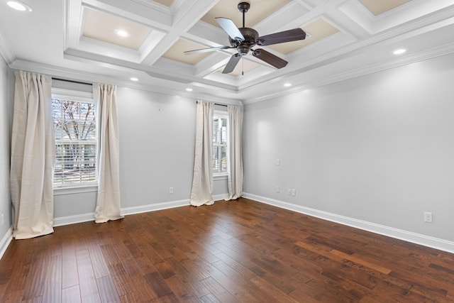 empty room with coffered ceiling, wood-type flooring, and crown molding