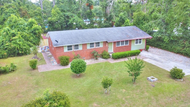2321 Frederick Pl, Valdosta, GA 31602 - single story home featuring a front yard, roof with shingles, and brick siding