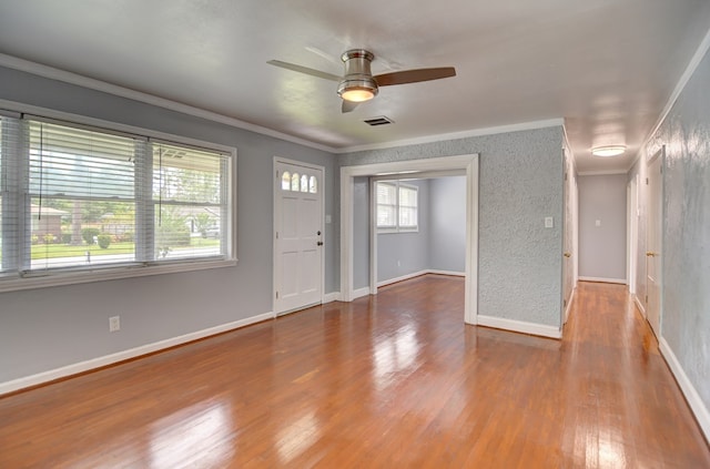2321 Frederick Pl, Valdosta, GA 31602 - entryway featuring a ceiling fan, wood finished floors, and ornamental molding