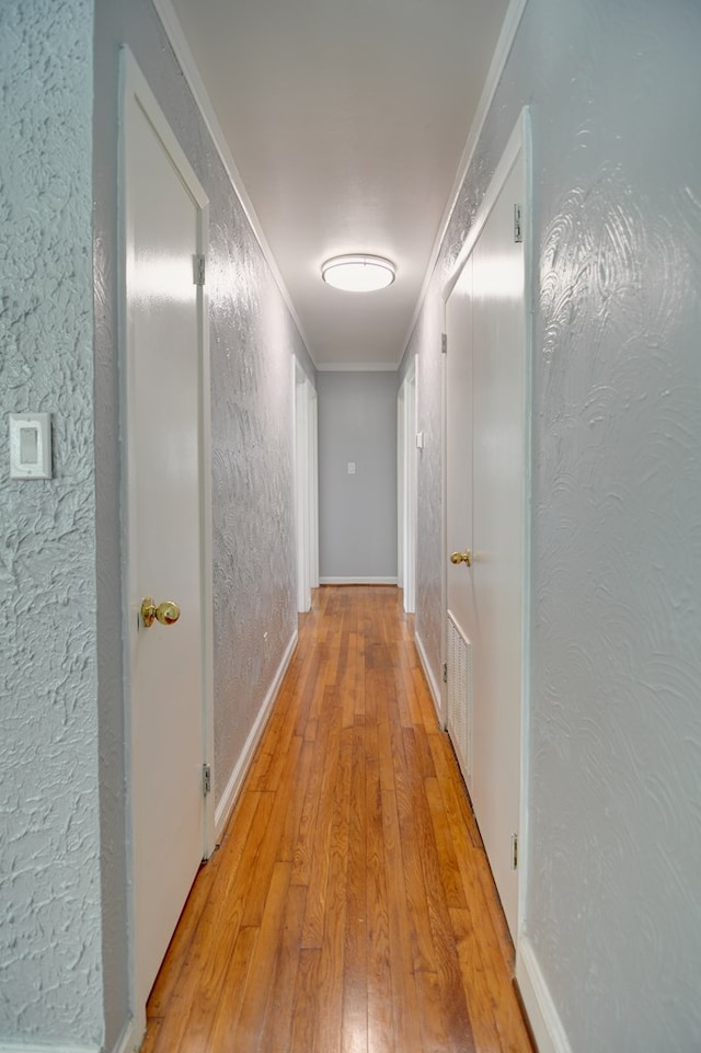 2321 Frederick Pl, Valdosta, GA 31602 - hall with light wood-style floors and ornamental molding