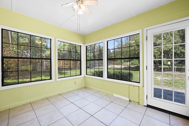 4312 Shiloh Trce, Valdosta, GA 31602 - unfurnished sunroom featuring tile patterned flooring and baseboards