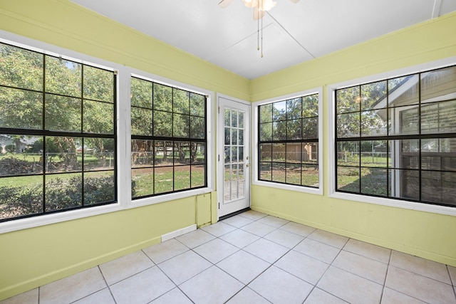 4312 Shiloh Trce, Valdosta, GA 31602 - unfurnished sunroom with healthy amount of natural light, tile patterned flooring, and baseboards