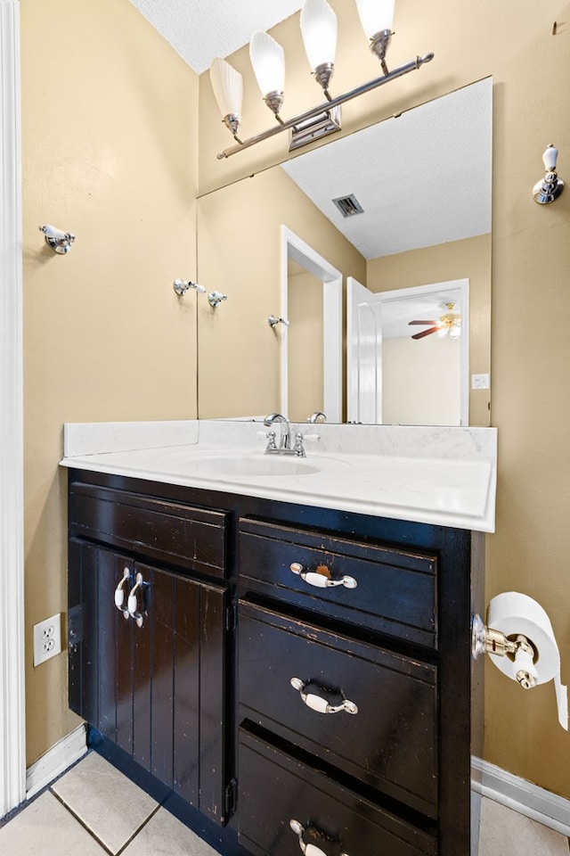 4312 Shiloh Trce, Valdosta, GA 31602 - bathroom featuring tile patterned floors, vanity, and baseboards