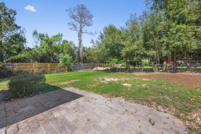 4312 Shiloh Trce, Valdosta, GA 31602 - view of yard featuring a patio area