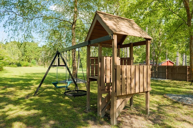 view of playground with a yard