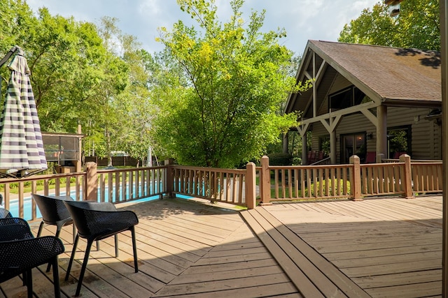 deck featuring a pool