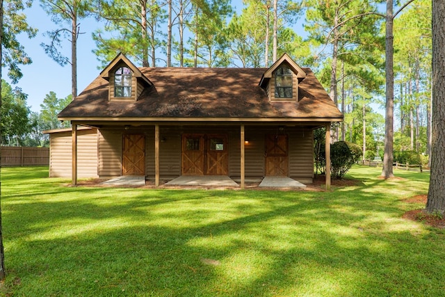 view of front of home with a front lawn