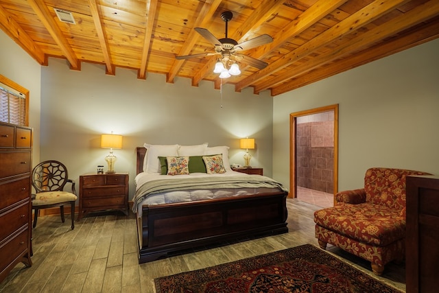 bedroom featuring ensuite bathroom, ceiling fan, wood-type flooring, beam ceiling, and wooden ceiling