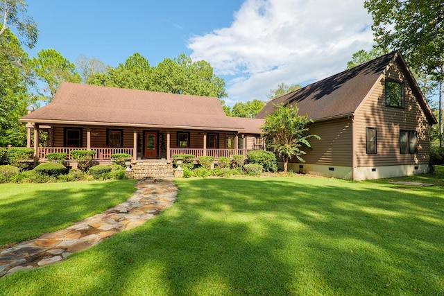 log-style house with a front lawn and a porch