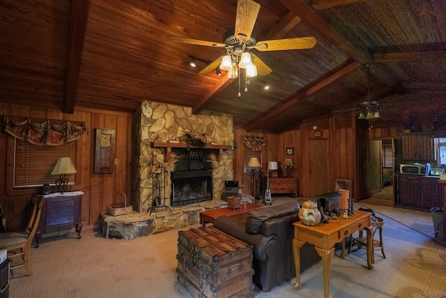 living room featuring vaulted ceiling with beams, wood walls, wooden ceiling, and a fireplace