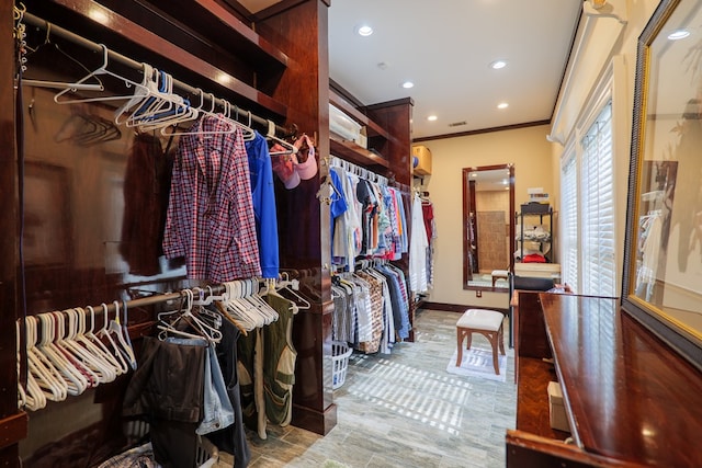 spacious closet featuring hardwood / wood-style flooring