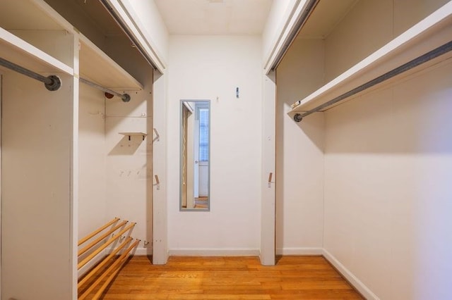 1614 N Patterson St, Valdosta, GA 31602 - walk in closet featuring light wood-type flooring