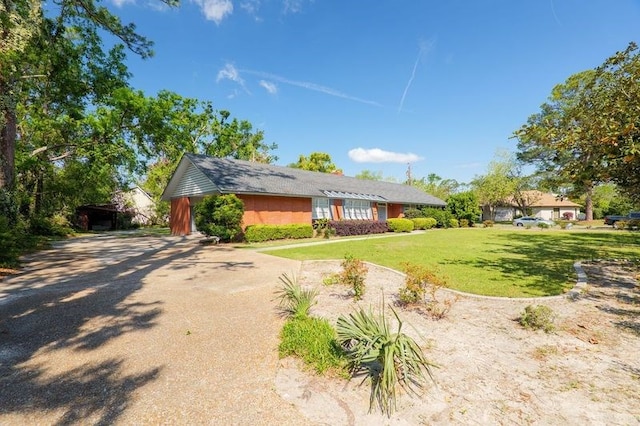 1614 N Patterson St, Valdosta, GA 31602 - exterior space featuring concrete driveway and a lawn