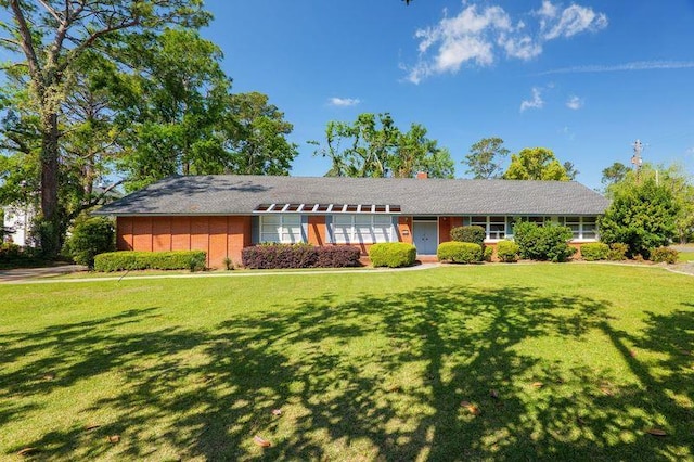 1614 N Patterson St, Valdosta, GA 31602 - ranch-style home with a front lawn